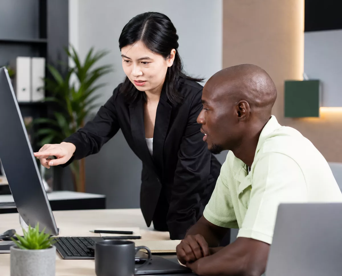 Trainer presenting information on a blackboard during a training session